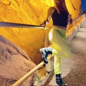 Neon green nylon pants
